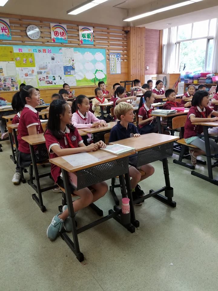 Preschool kids in classroom at school in China